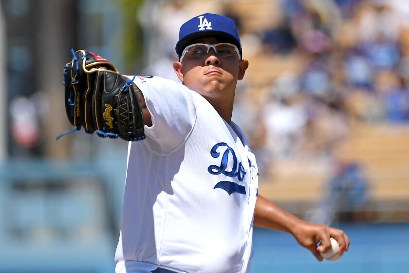 LOS ANGELES, CA - SEPTEMBER 08: Julio Urias #7 of the Los Angeles Dodgers pitches in the first inning of the game against the San Francisco Giants at Dodger Stadium on September 8, 2019 in Los Angeles, California. (Photo by Jayne Kamin-Oncea/Getty Images)