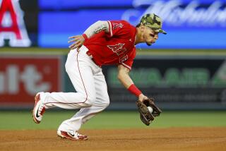 ANAHEIM, CA - MAY 21: Los Angeles Angels shortstop Andrew Velazquez (4) fields a ground ball.