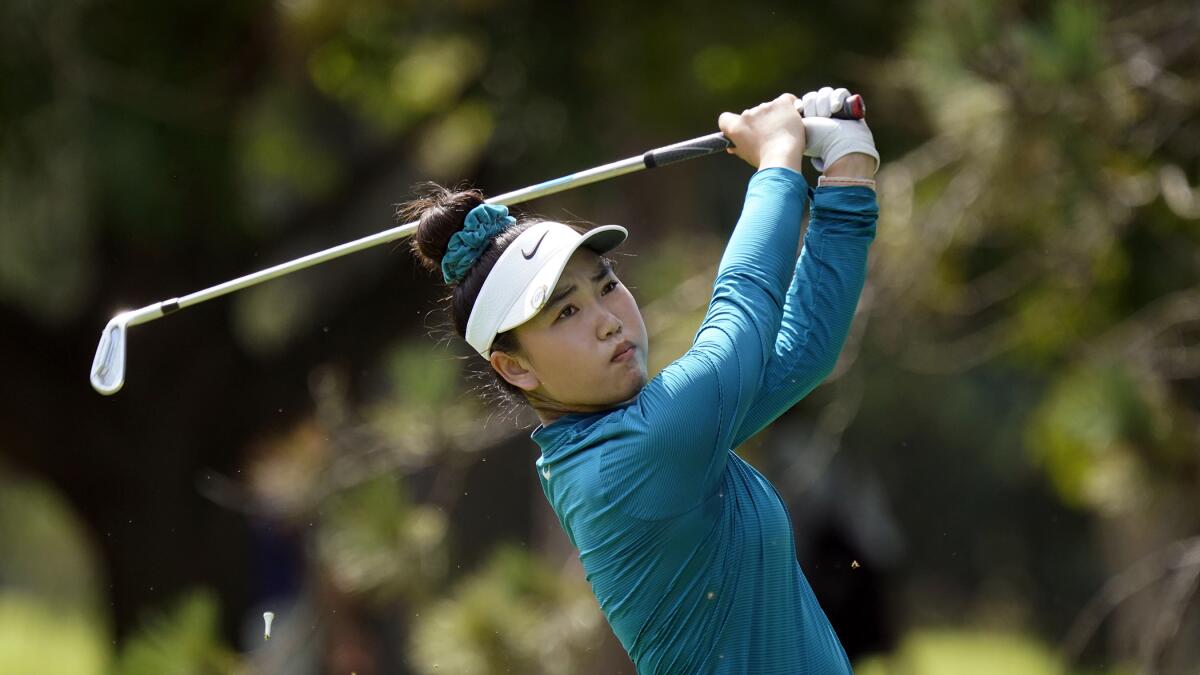 Lucy Li follows through on her tee shot on the second hole during the second round of the Dana Classic LPGA golf tournament Friday, Sept. 2, 2022, at the Highland Meadows Golf Club in Sylvania, Ohio. (AP Photo/Gene J. Puskar)