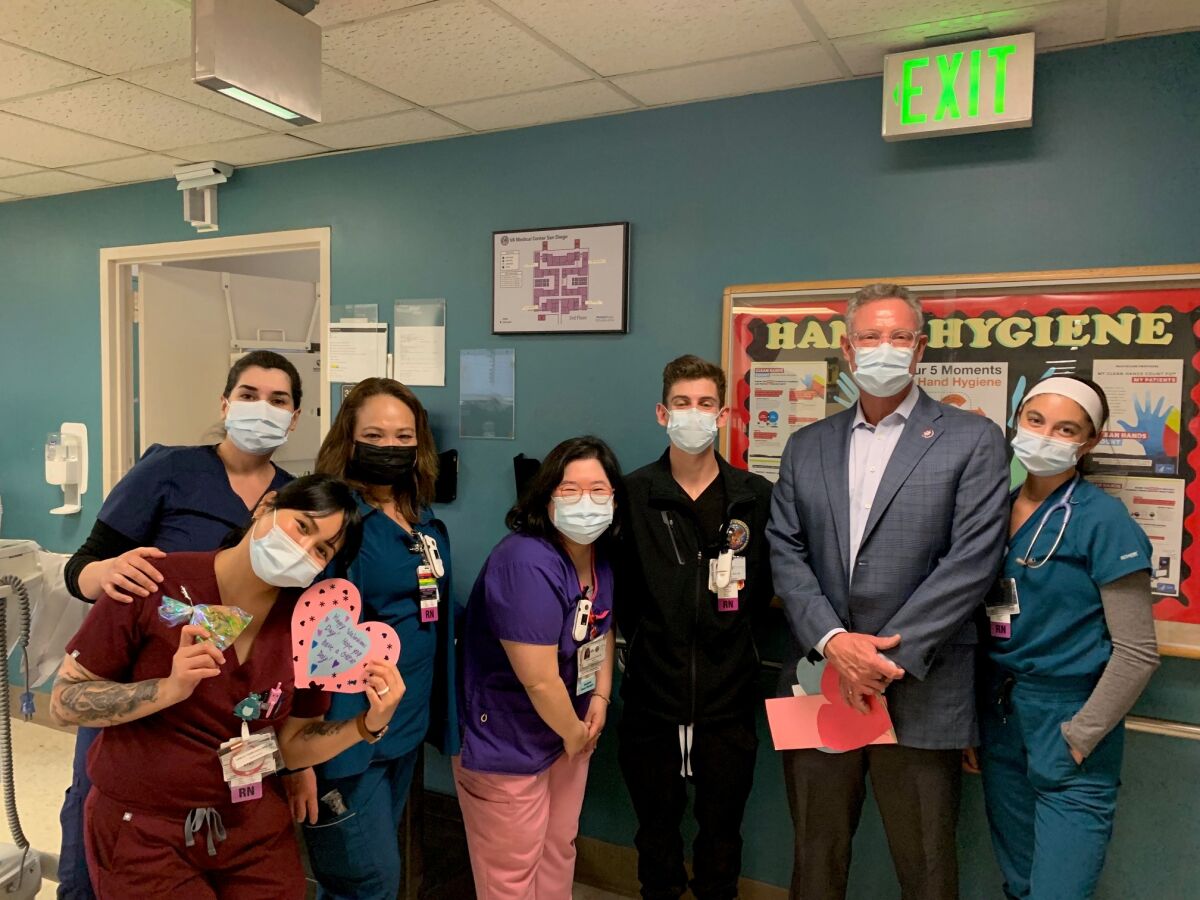 Rep. Scott Peters poses on Valentine's Day with staff members at the Jennifer Moreno VA Medical Center in La Jolla.