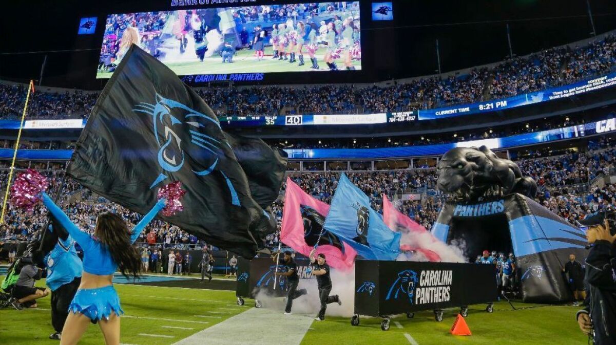 The Carolina Panthers take the field before an Oct. 10 game against the Tampa Bay Buccaneers on 'Monday Night Football."