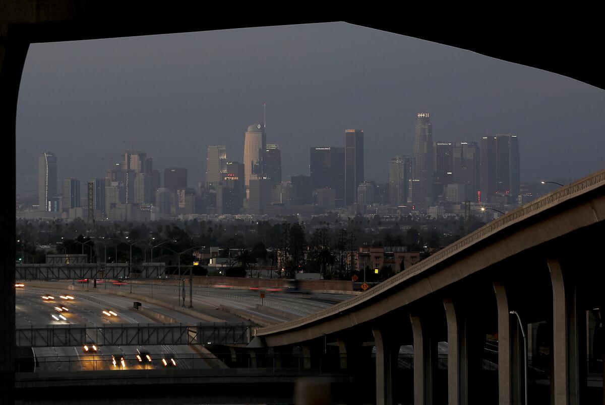 Light traffic moves through the Harbor and Century freeway interchange in Los Angeles on April 2, 2020, during the coronavirus lockdown.