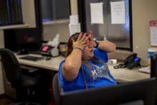 SAN ANTONIO, TX- JUNE 24, 2022: A staff member reacts after just hearing the news that the Supreme Court overturned Roe v. Wade shutting down abortion services at Alamo Women's Reproductive Services on June 24, 2022 in San Antonio, Texas. The clinic had to turn patients away once the ruling came down.(Gina Ferazzi / Los Angeles Times)