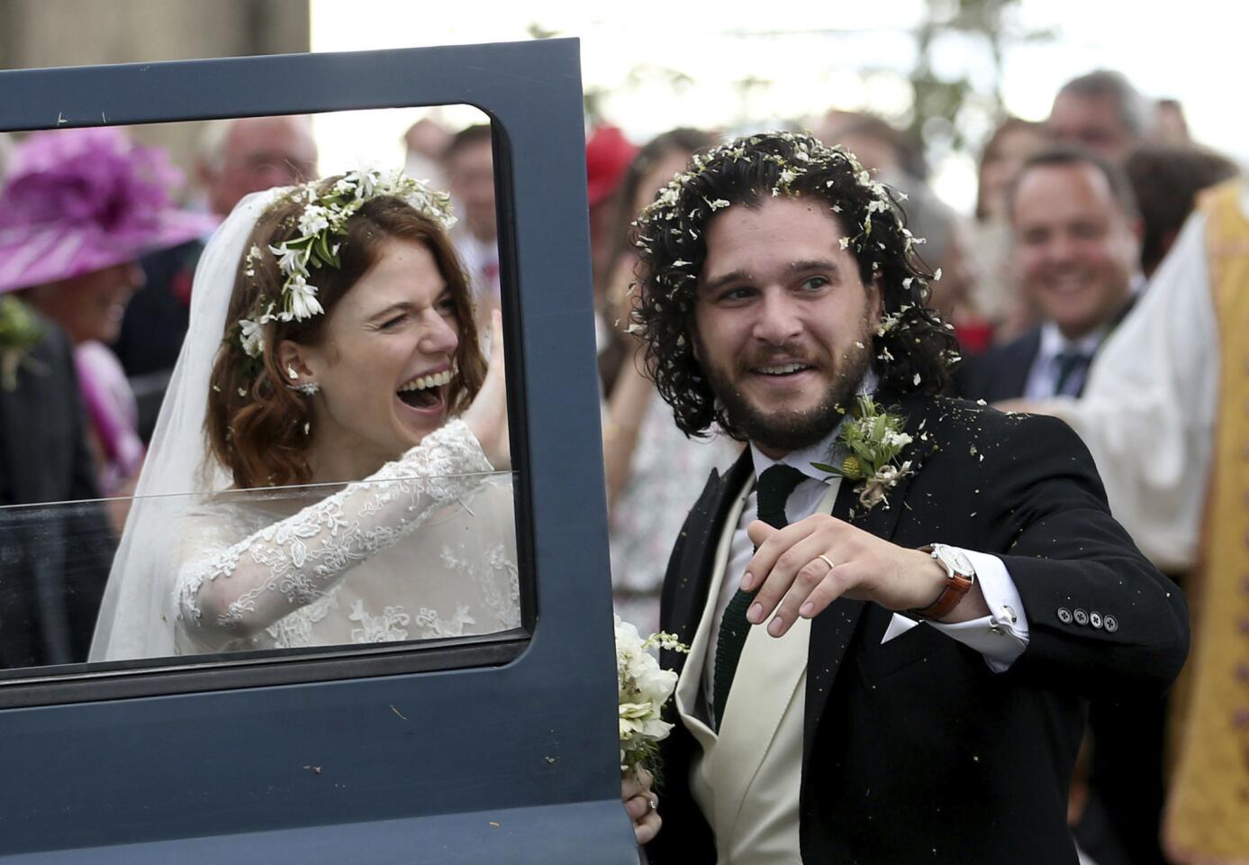 Actors Kit Harington and Rose Leslie depart after their wedding ceremony at Rayne Church, Kirkton of Rayne in Aberdeenshire, Scotland, on Saturday, June 23, 2018.