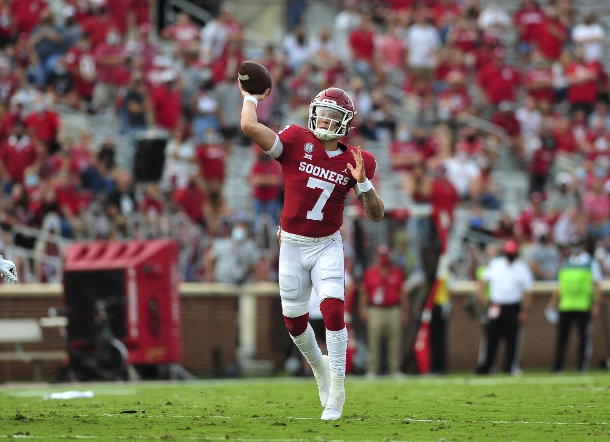 Oklahoma quarterback Spencer Rattler throws a pass against Missouri State during an NCAA college football game Saturday, Sept. 12, 2020, in Norman, Okla. (Kyle Phillips/The Norman Transcript via AP)