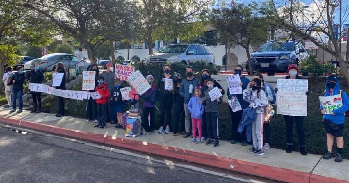 Torrey Pines Elementary School parents and students rally in support of COVID-19 safety measures