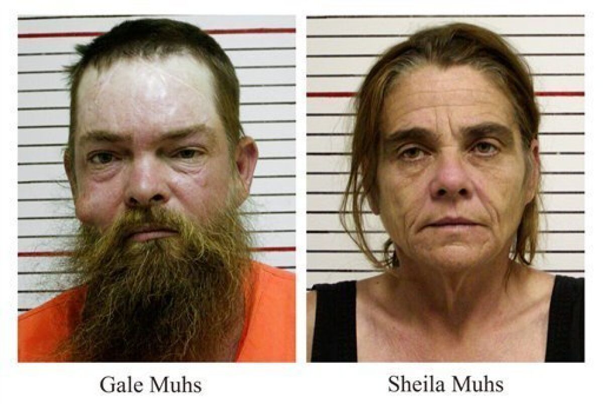 These May 7, 2009 booking photos released by the Liberty County, Texas, Sheriff's Office show Gale and Sheila Muhs who have been charged with shooting four people, including a 7-year-old boy and a 5-year-old girl, who they mistakenly thought were trespassing on their property Thursday night. The victims were off-roading near Dayton, Texas, when the couple opened fire, according to officials. (AP Photo/Liberty County Sheriff's Office)