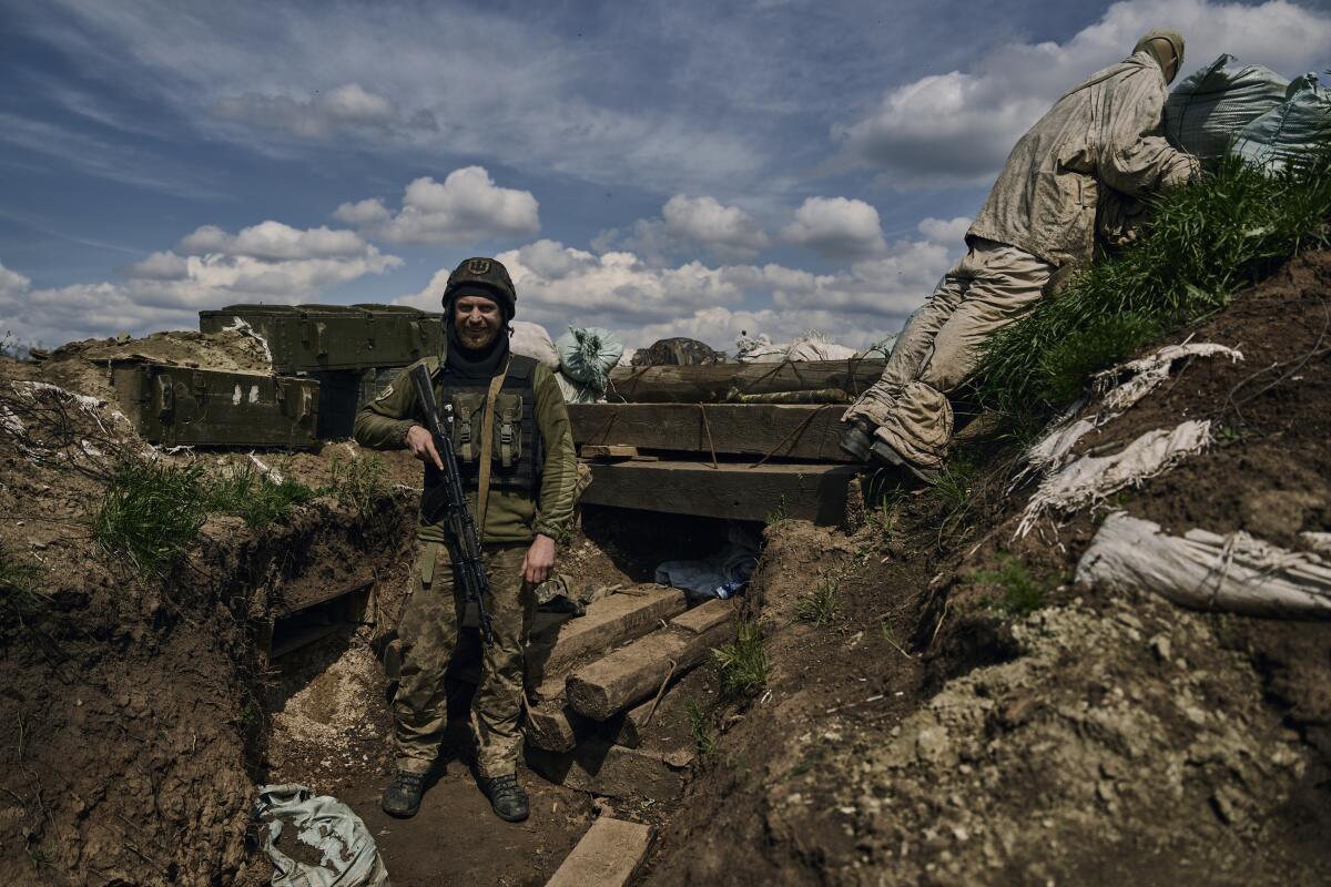 Ukrainian soldier in a trench