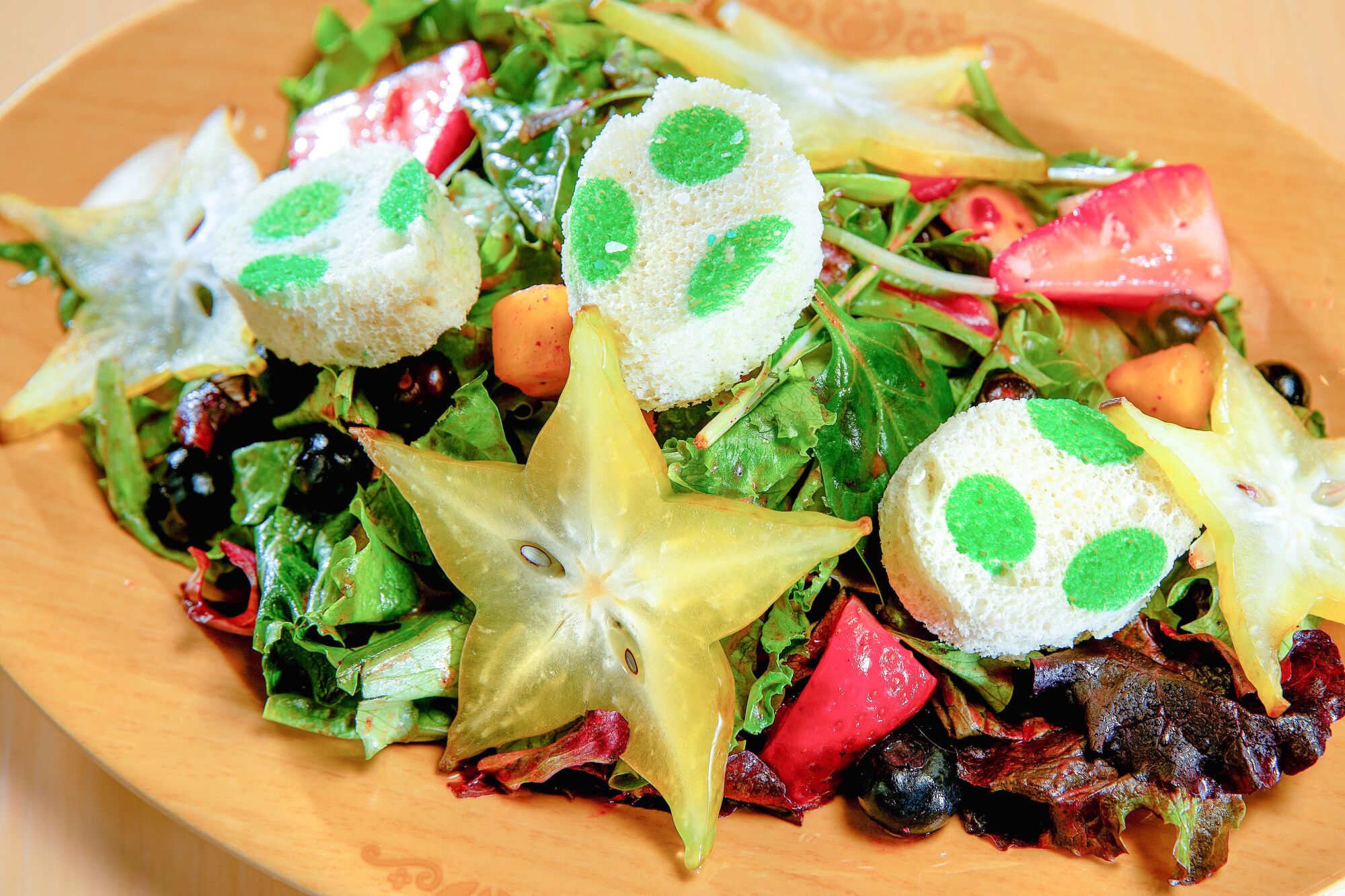 Yoshi’s Favorite Fruit and Veggie Salad is on the menu at Toadstool Cafe.