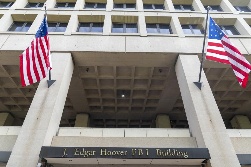 FILE - The J. Edgar Hoover FBI Building is seen June 9, 2023, in Washington. Federal agencies are warning that foreign terrorist organizations or their supporters might target LGBTQ-related events and venues as part of the upcoming June Pride Month. The FBI and the Department of Homeland Security issued the announcement May 10, 2024, to raise awareness of "foreign terrorist organizations" or their supporters potentially targeting such events and venues. (AP Photo/Alex Brandon, File)