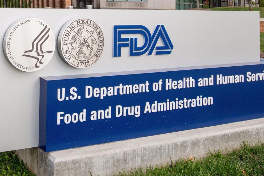 FILE - This Oct. 14, 2015, file photo, shows the U.S. Food & Drug Administration campus in Silver Spring, Md. On Monday, Nov. 13, 2017, the FDA approved the first drug in the United States with a digital ingestion tracking system, in an unprecedented move to ensure that patients with mental illness take the medicine prescribed for them. The drug Abilify MyCite was developed by Otsuka Pharmaceutical Co., Ltd. (AP Photo/Andrew Harnik, File)