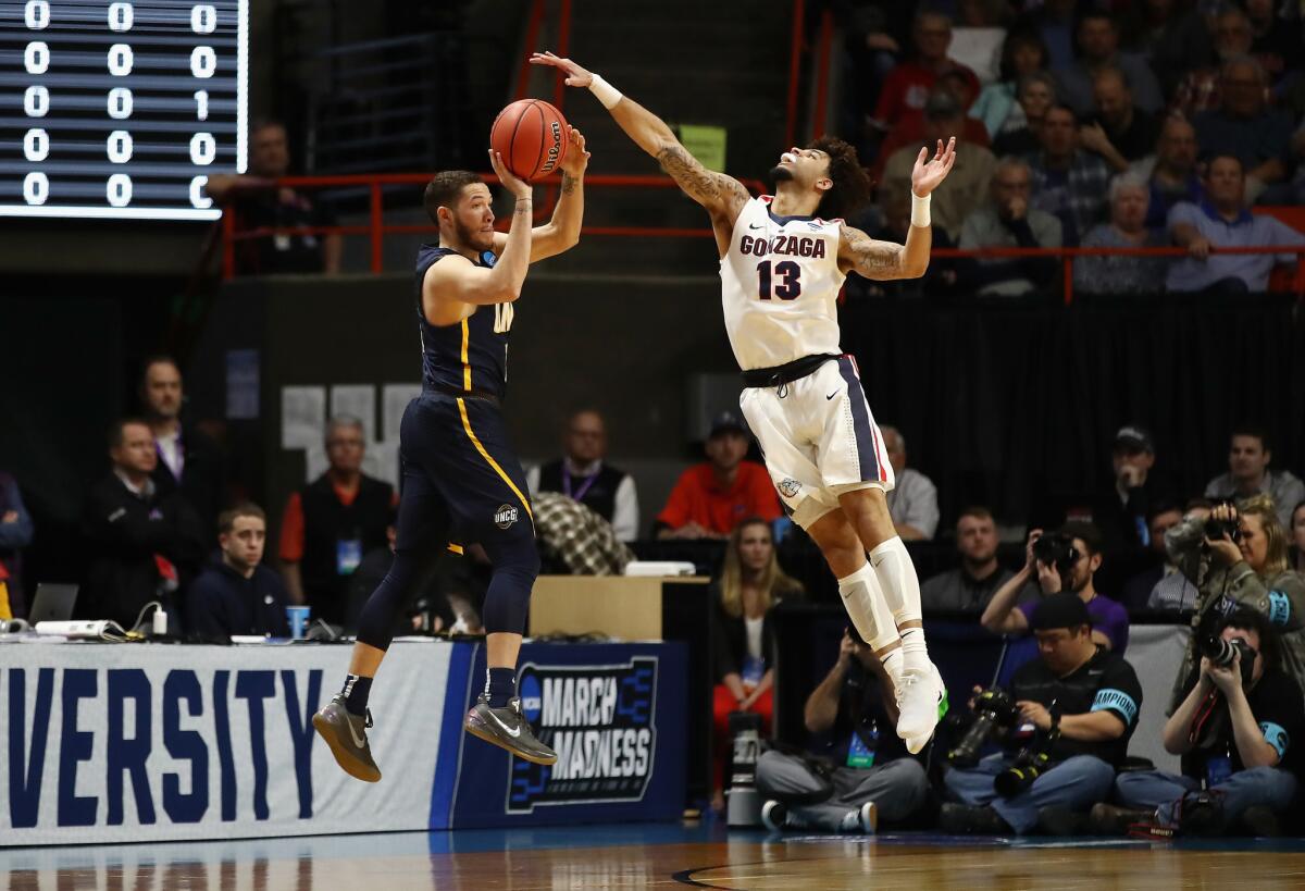 UNC Greensboro's Demetrius Troy handles the ball against Gonzaga's Josh Perkins.