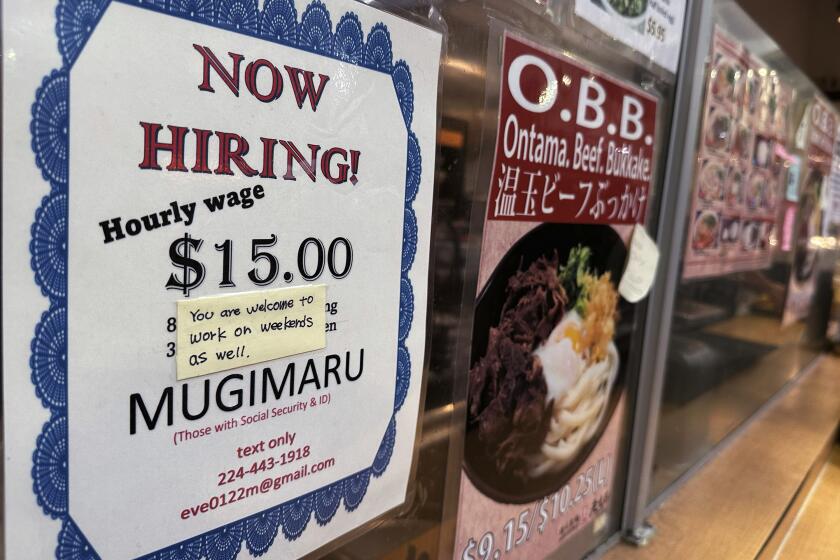 FILE - A hiring sign is displayed at a restaurant in Arlington Heights, Ill., June 28, 2024. (AP Photo/Nam Y. Huh, File)