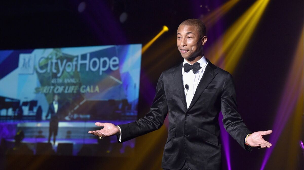 Pharrell Williams speaks onstage during the City of Hope Spirit of Life Gala.