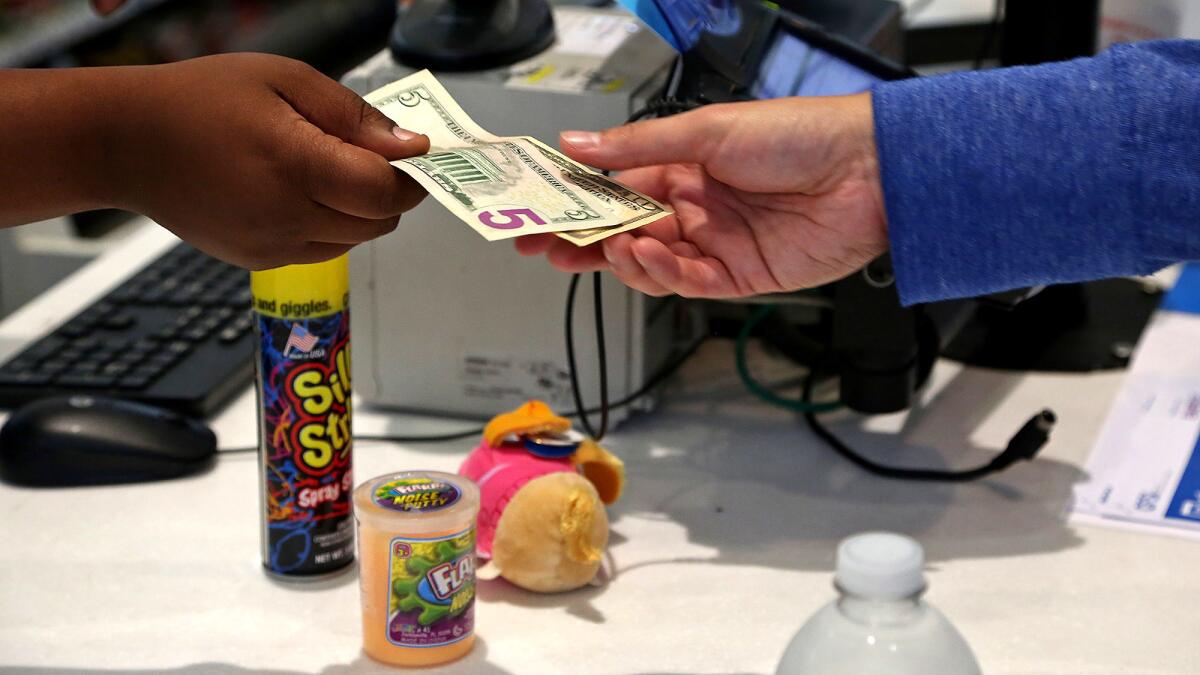 Chay makes a purchase at a Walgreens in Hollywood.