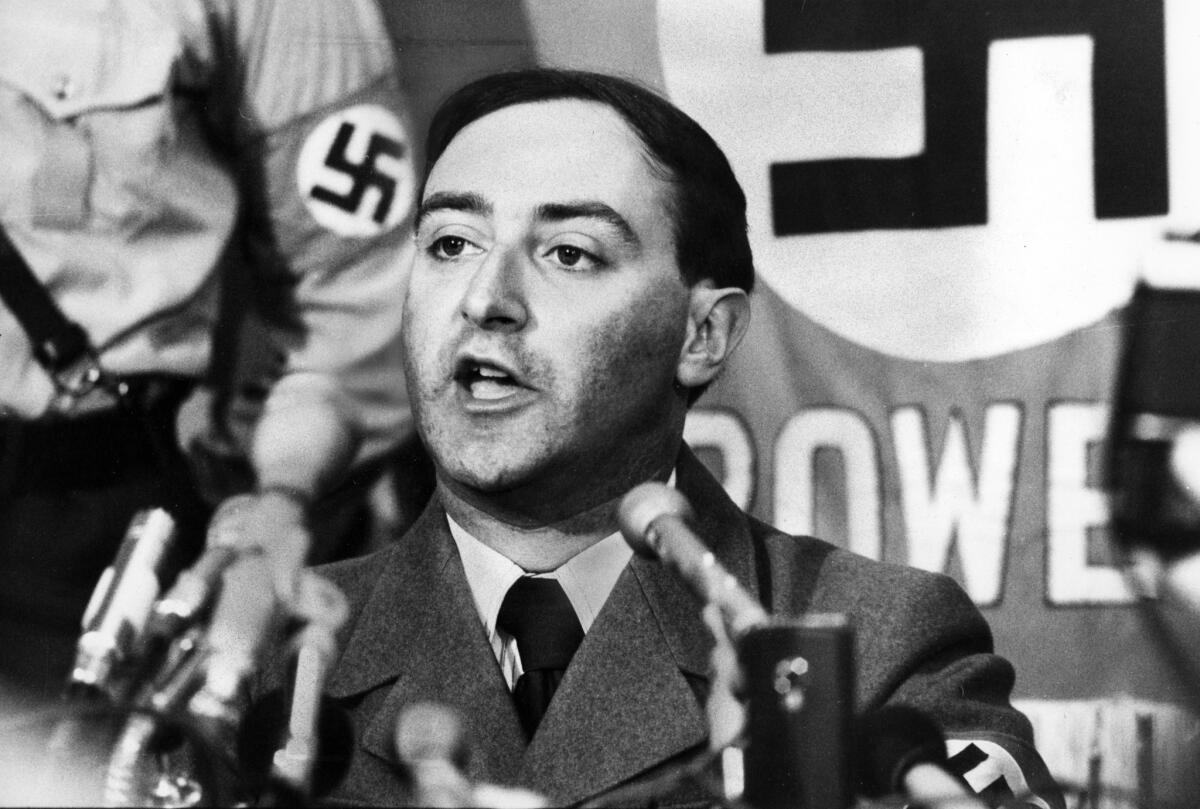 National Socialist Party of America leader Frank Collin holds a press conference officially announcing the cancellation of his group's march in heavily-Jewish Skokie in 1978, which was defended successfully by the ACLU. Collin would instead march in Chicago's Marquette Park, symbolically where Dr. Martin Luther King Jr. was once attacked by a racist mob, and downtown.