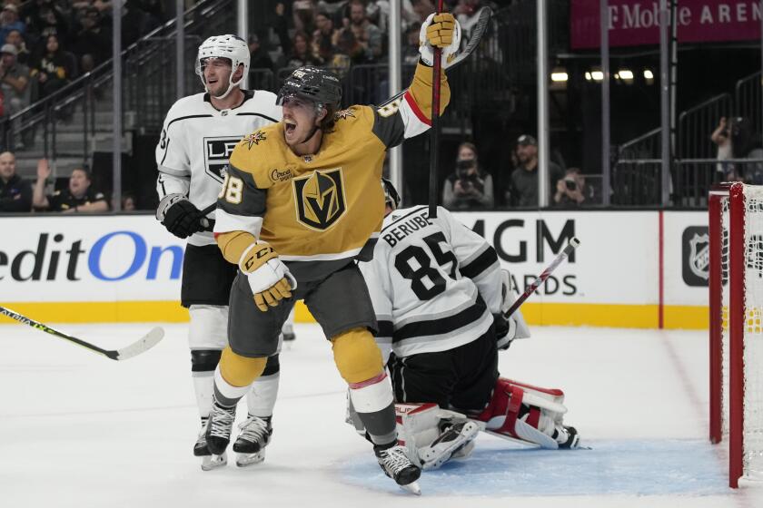 Vegas Golden Knights' Maxime Comtois celebrates after his team scored against the Los Angeles Kings during the second period of an NHL hockey preseason game Wednesday, Sept. 27, 2023, in Las Vegas. (AP Photo/John Locher)