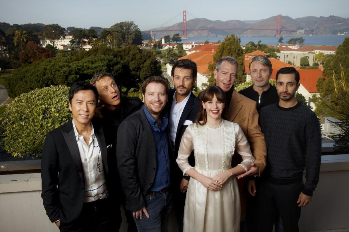 The cast of "Rogue One: A Star Wars Story": From left, Donnie Yen, Alan Tudyk, director Gareth Edwards, Diego Luna, Felicity Jones, Ben Mendelsohn, Mads Mikkelsen and Riz Ahmed.