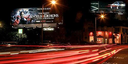 A billboard along Sunset Boulevard advertises Angels & Demons, one of a dozen high-profile movies that studios together will spend about $1 billion to market worldwide from May through August.