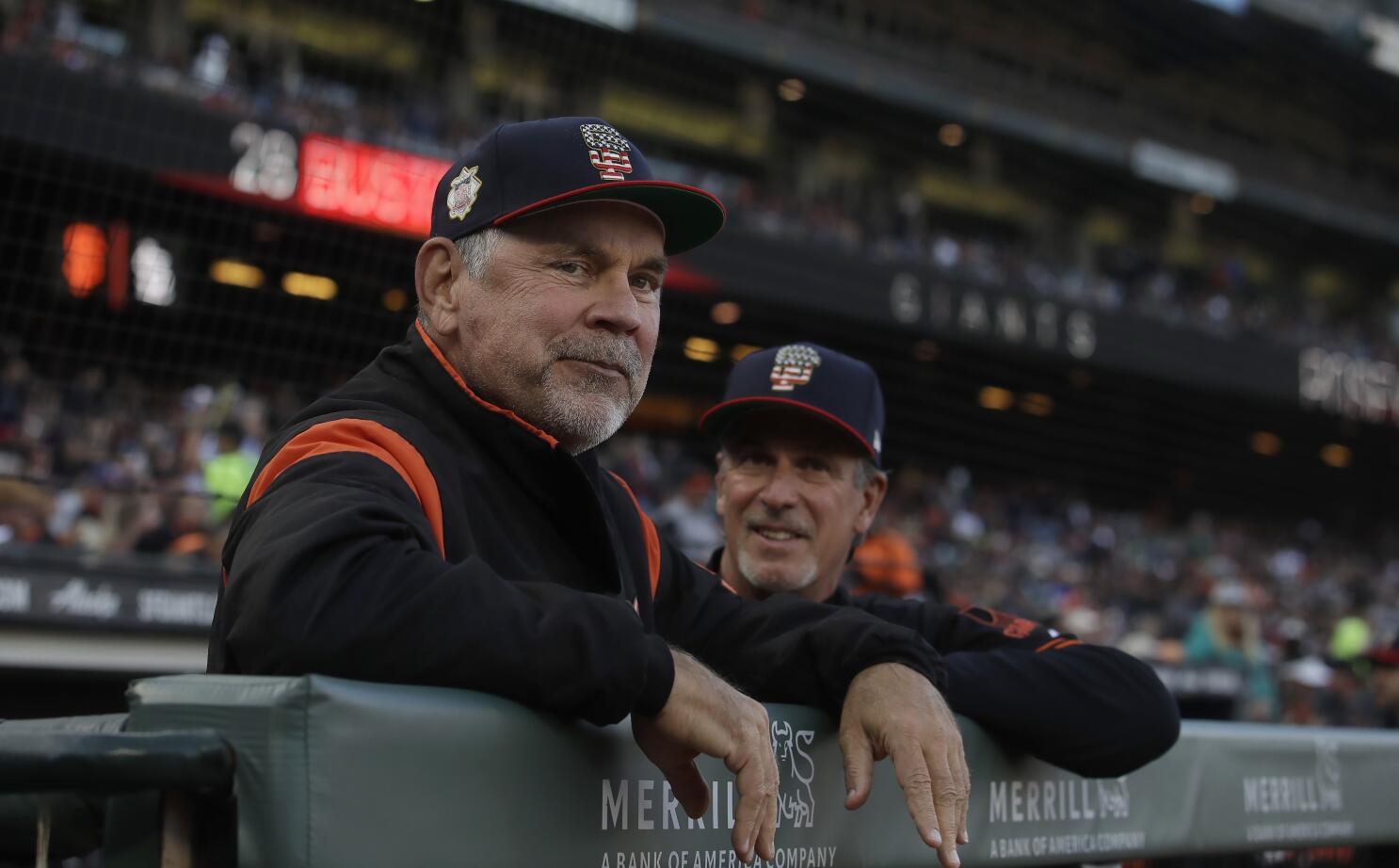 Giants manager Bruce Bochy returns to the locker room after the News  Photo - Getty Images