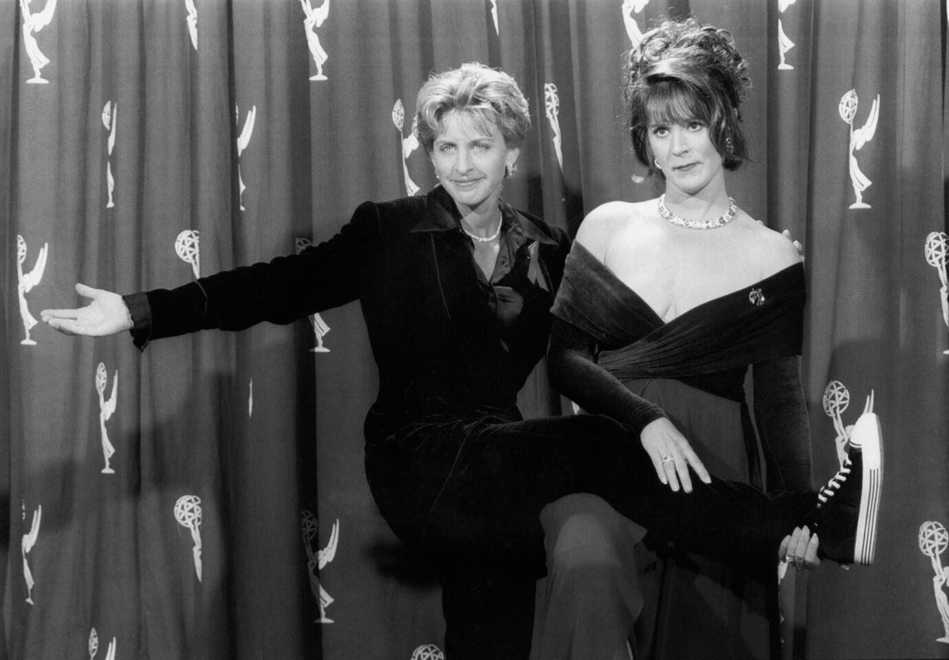 In 2001, DeGeneres was tasked with entertaining a post-9/11 audience. The Louisiana native returned to the 2005 Emmy stage, again bringing much-needed laughter to viewers less than a month after Hurricane Katrina. (DeGeneres and Emmy nominee Patricia Richardson during the 1994 telecast.)
