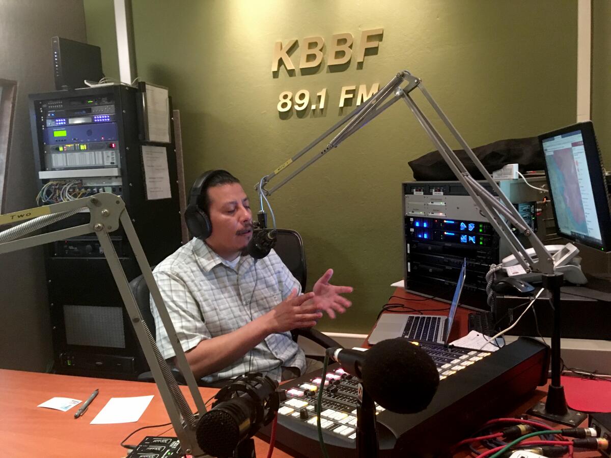 Rafael Vazquez, a volunteer at KBBF-FM