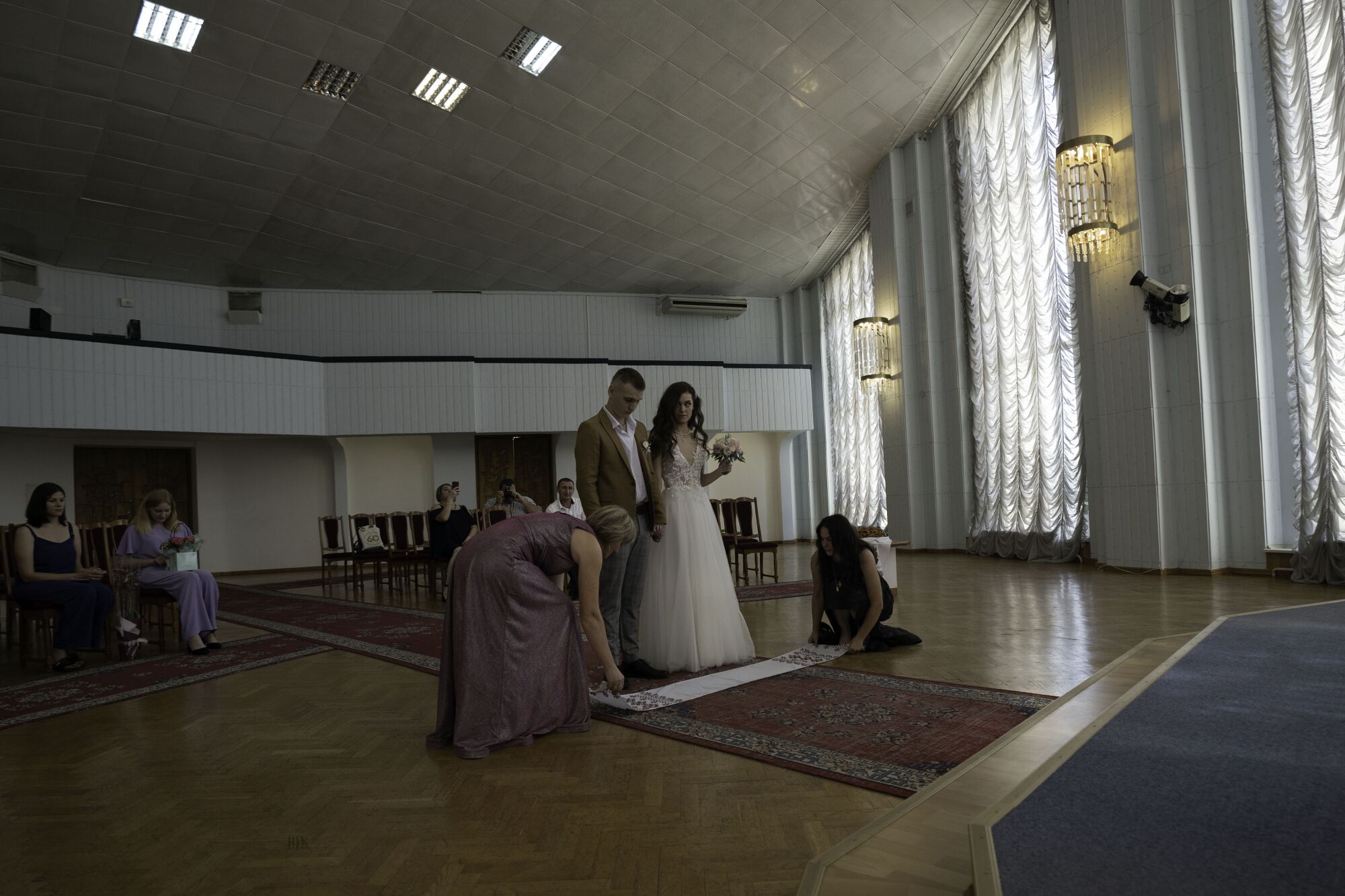 A couple prepares to get married at Kyiv's central registry office 
