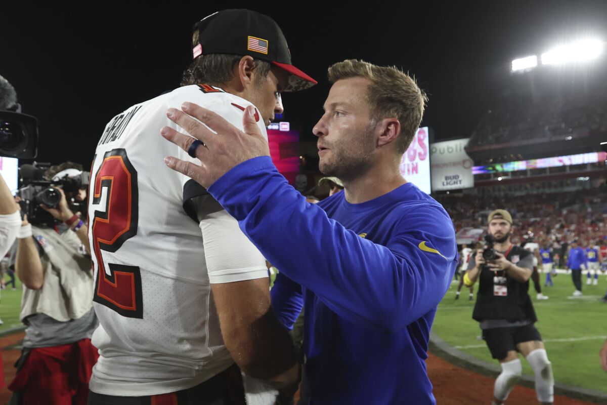 Rams coach Sean McVay congratulates Tom Brady after the Buccaneers quarterback led a comeback victory.