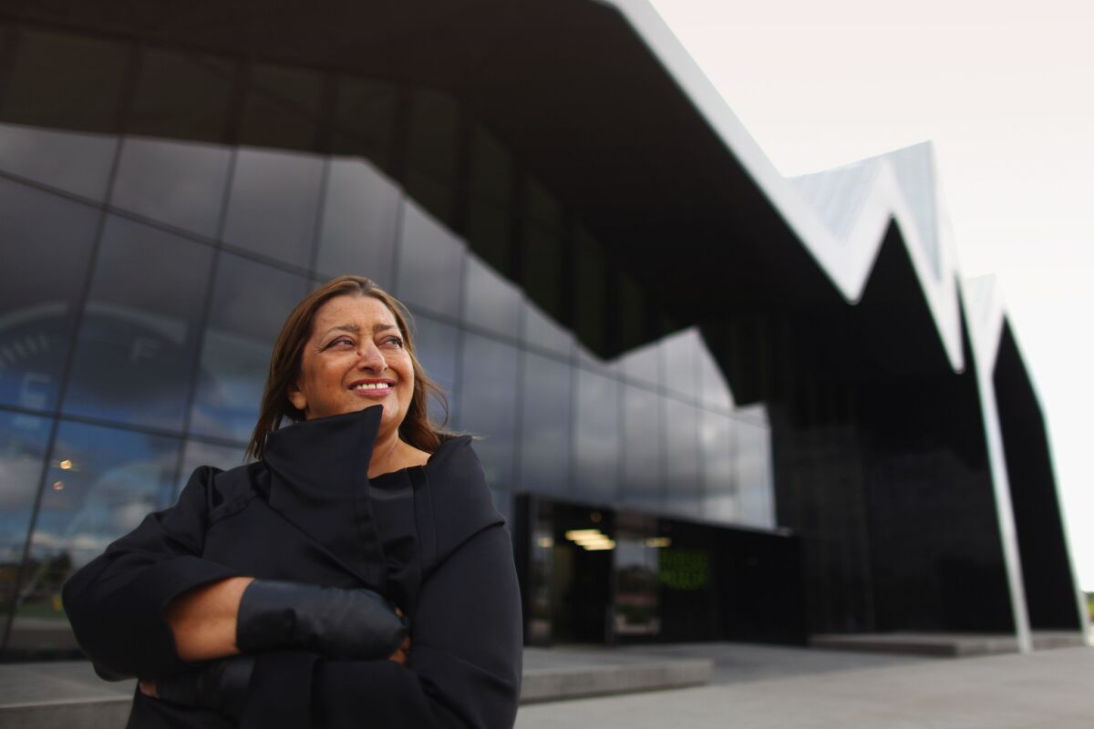 Zaha Hadid in 2009 outside her Riverside Museum in Glasgow, Scotland. Hadid, the first woman to win the Pritzker Prize, architecture's highest honor, has died at age 65.