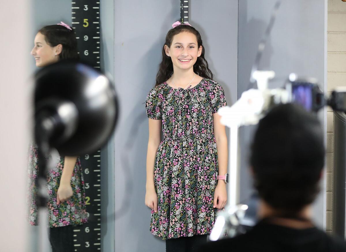 Delaney Schmidt has her picture taken during the casting call for the 2024 Pageant of the Masters show.
