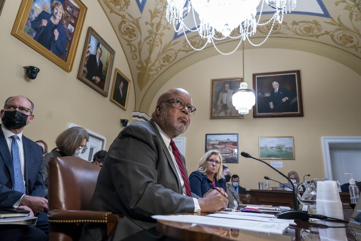 Chairman Bennie Thompson, D-Miss., and Vice Chair Liz Cheney, R-Wyo., of the House panel investigating the Jan. 6 U.S. Capitol insurrection, testify before the House Rules Committee seeking contempt of Congress charges against former President Donald Trump's White House chief of staff Mark Meadows for not complying with a subpoena, at the Capitol in Washington, Tuesday, Dec. 14, 2021. A House vote to hold him in contempt would refer the charges to the Justice Department, which will decide whether to prosecute the former Republican congressman. (AP Photo/J. Scott Applewhite)