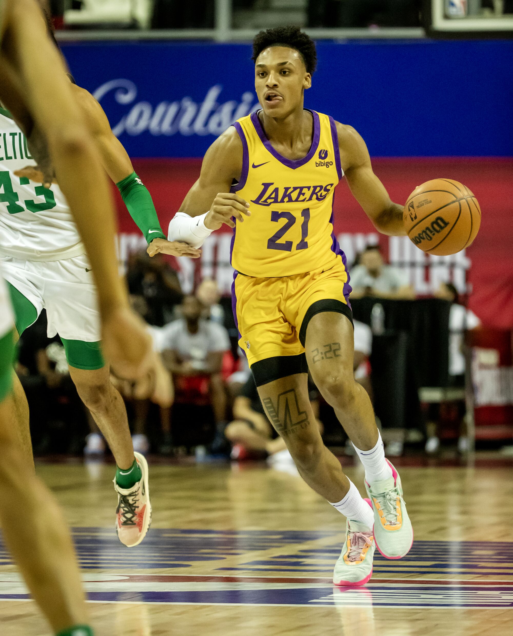 Maxwell Lewis controls the ball during an NBA Summer League game against the Boston Celtics.