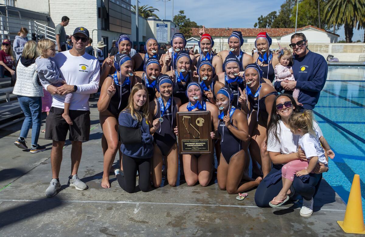 Newport Harbor celebrates beating Laguna Beach 9-2 in the CIF State Southern California Regional Division I title match.