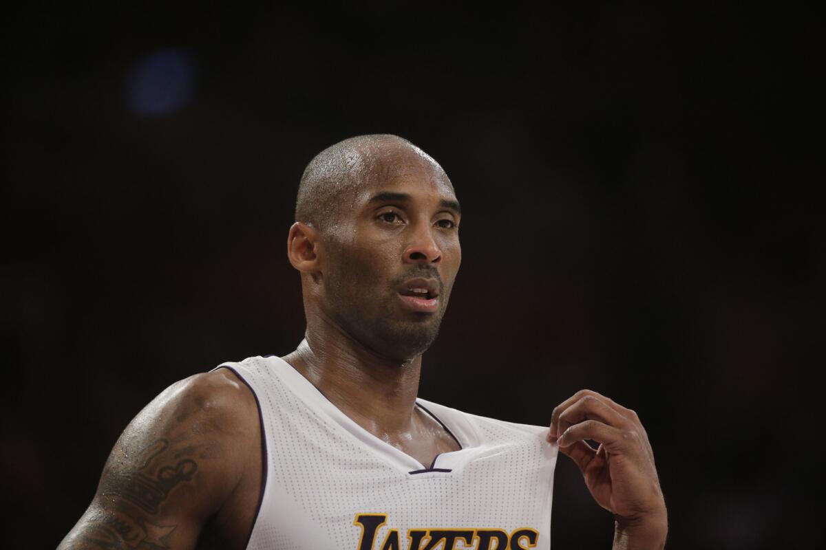 Kobe Bryant had 31 points, 12 assists and 11 rebounds Sunday in a 129-122 overtime victory against Toronto.