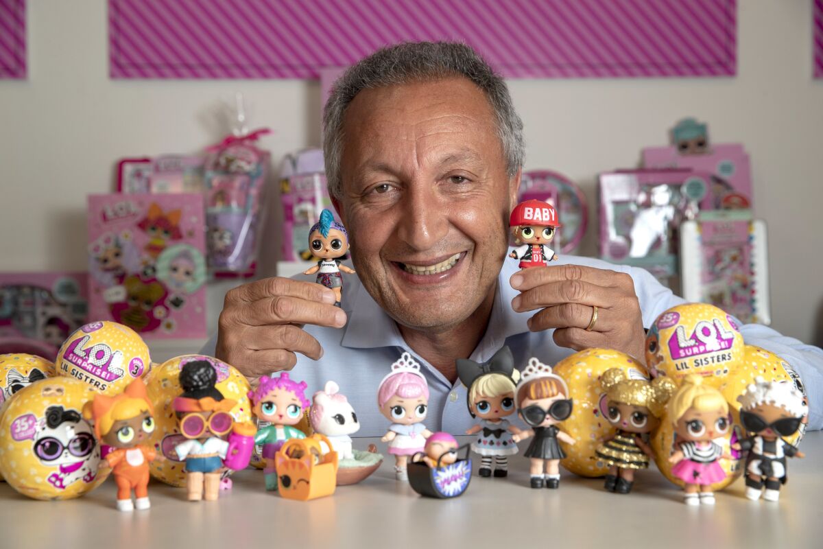 Isaac Larian, chief executive and founder of MGA Entertainment, surrounded by MGA's L.O.L. Surprise! dolls at his company's headquarters in Van Nuys. Over the past year, MGA has repeatedly sued alleged counterfeiters profiting from selling fake dolls.
