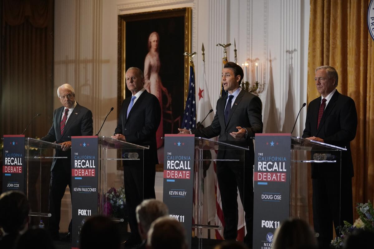 Republican candidates for California stand at podiums