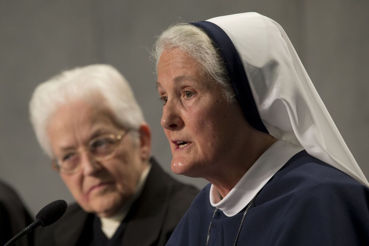 Sister Sharon Holland, left, and Mother Agnes Mary Donovan attend a news conference at the Vatican.