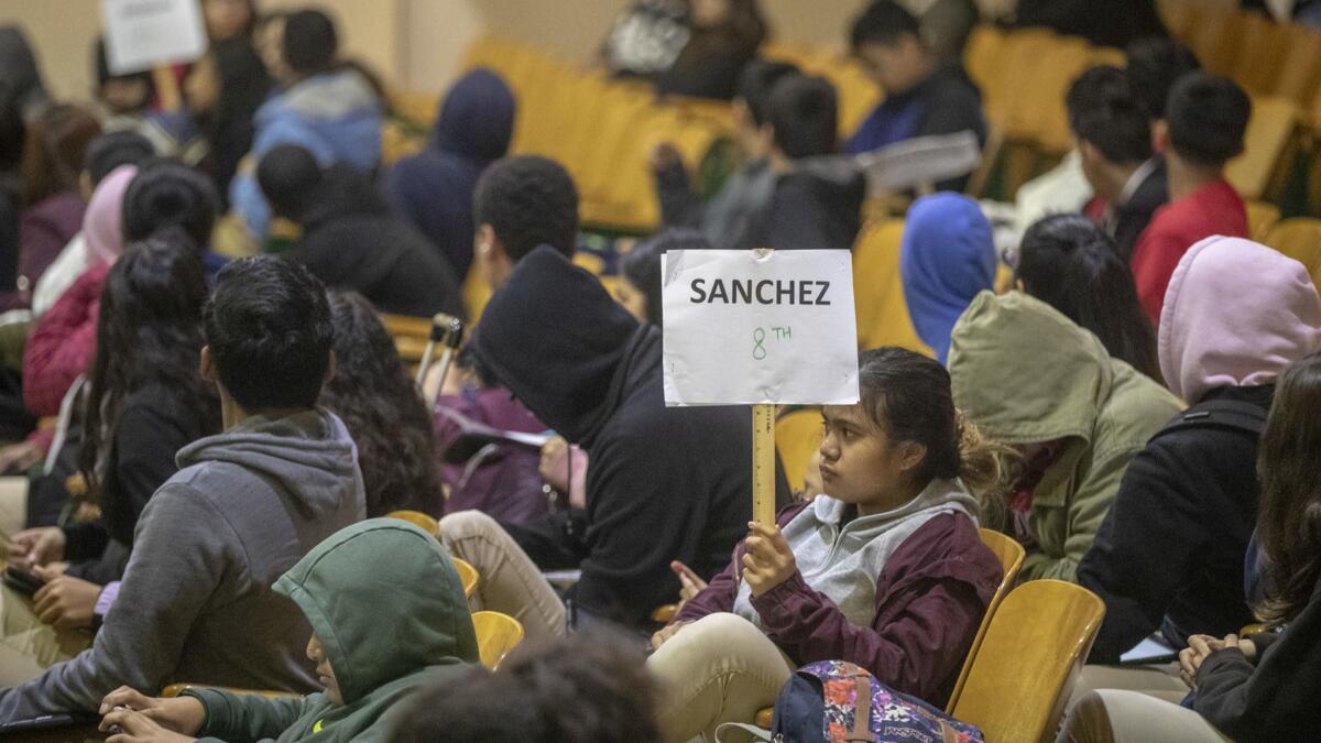 Burroughs Middle School students wait for assignments during roll call at the Hancock Park school on Tuesday.