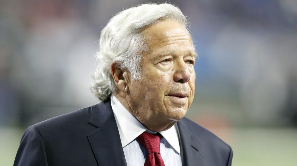 New England Patriots owner Robert Kraft walks the sidelines before a game in Detroit on Sept. 9.
