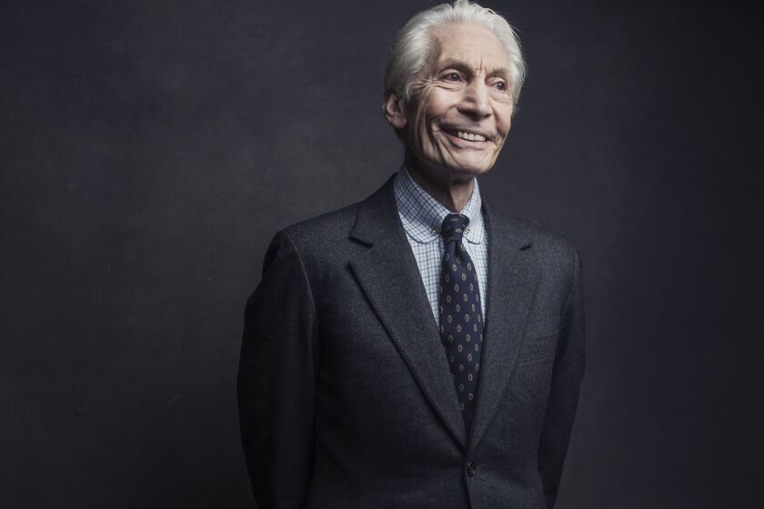 FILE - Charlie Watts of the Rolling Stones poses for a portrait on Nov. 14, 2016, in New York. Watts' publicist, Bernard Doherty, said Watts passed away peacefully in a London hospital surrounded by his family on Tuesday, Aug. 24, 2021. He was 80. (Photo by Victoria Will/Invision/AP, File)