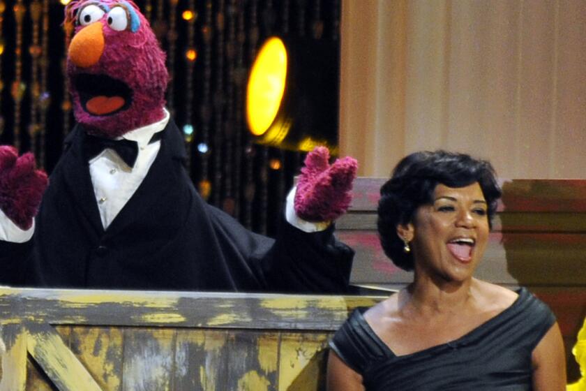 Actress Sonia Manzano, right, performs at the Daytime Emmy Awards in Los Angeles in 2009.