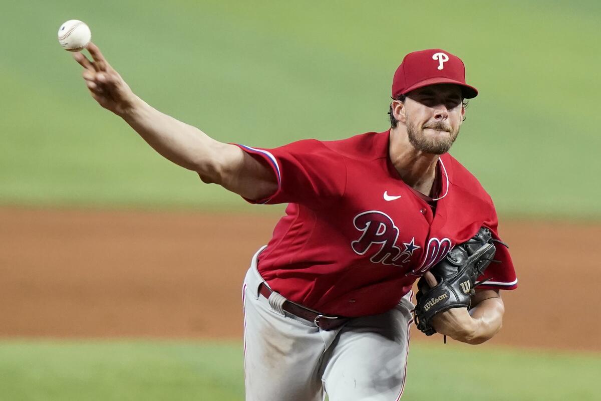 Philadelphia Phillies starting pitcher Aaron Nola throws during the ninth inning of a baseball game against the Miami Marlins, Sunday, July 17, 2022, in Miami. The Phillies won 4-0. (AP Photo/Lynne Sladky)