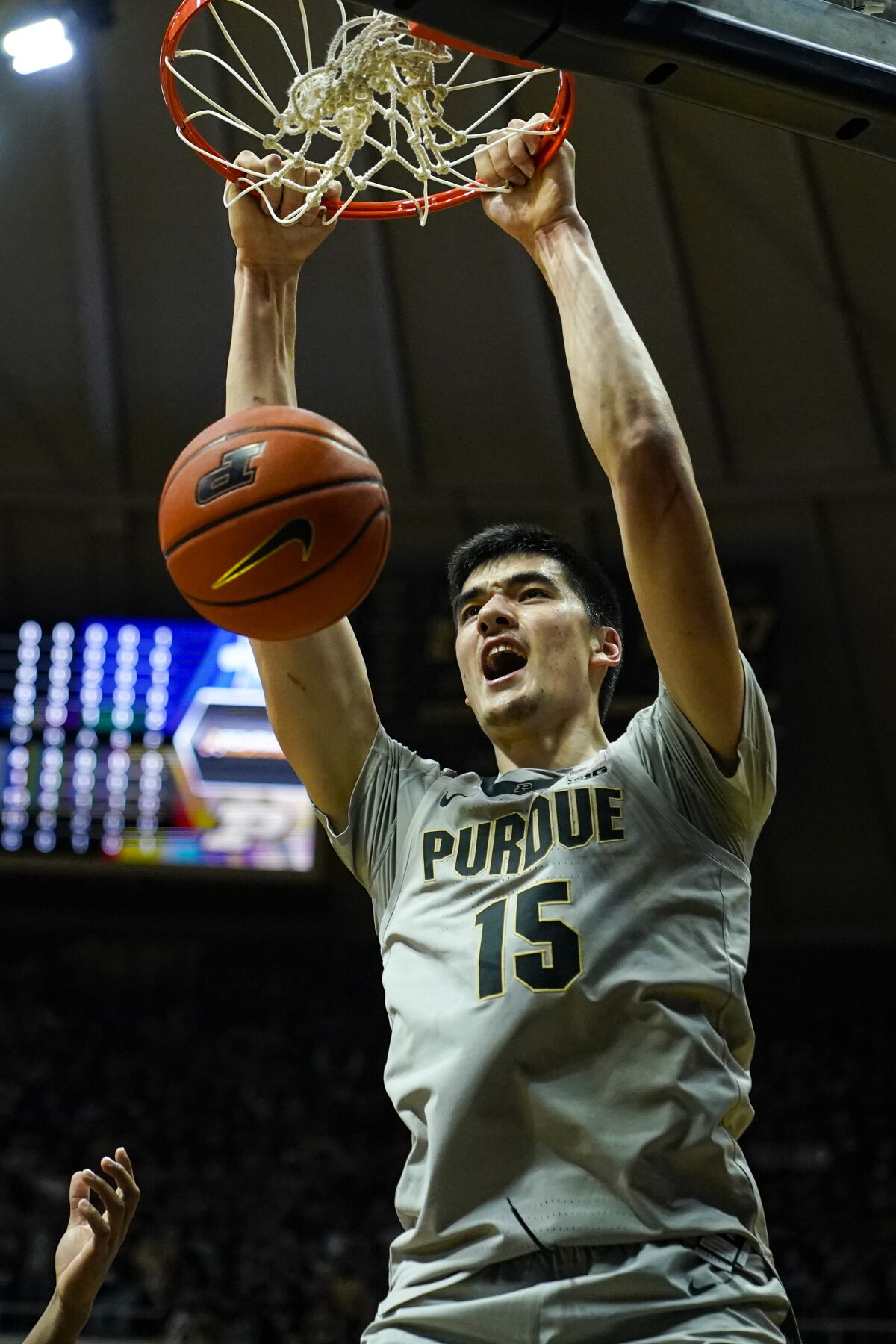 Purdue center Zach Edey (15) reacts after a dunk against Indiana State during the first half of an NCAA college basketball game in West Lafayette, Ind., Friday, Nov. 12, 2021. (AP Photo/Michael Conroy)