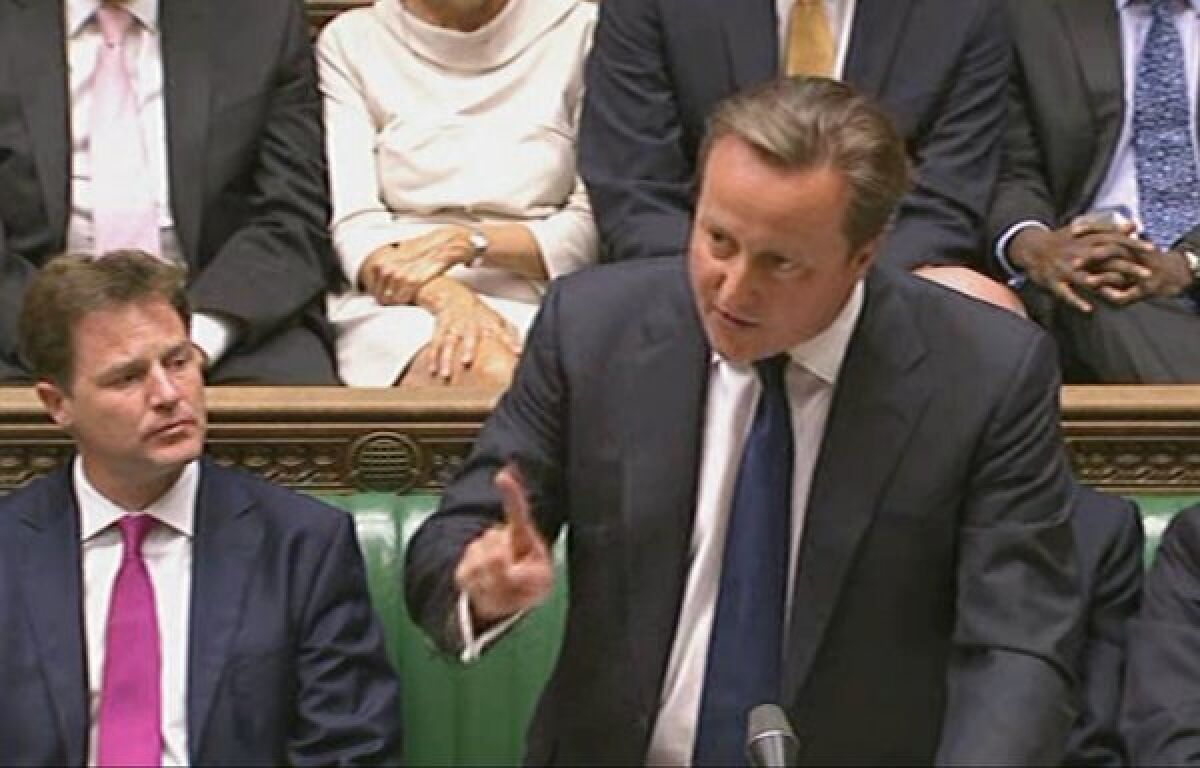 Footage broadcast by the British Parliamentary Recording Unit shows Prime Minister David Cameron delivering a statement to lawmakers.