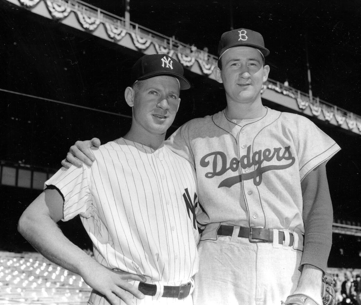 Opposing pitchers Whitey Ford, New York Yankees, and Roger Craig, Brooklyn Dodgers, before Game 3 of the 1956 World Series.