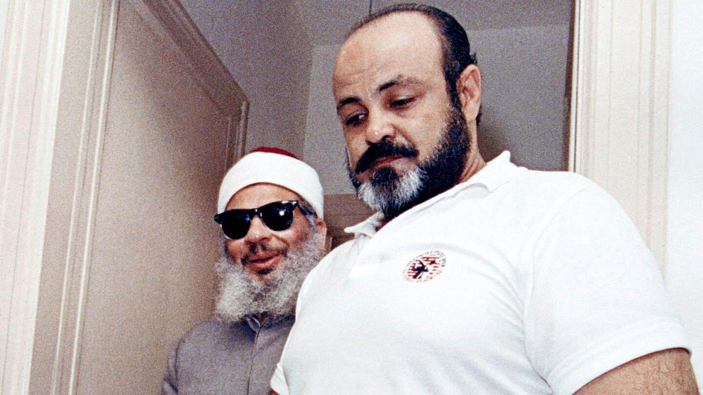 Emad Salem escorts Omar Abdel Rahman in 1993 in Jersey City, N.J. Salem was an undercover informant while serving as head of security for Abdel Rahman.