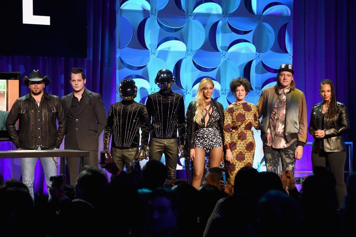 Jason Aldean, Jack White, Daft Punk, Beyonce, Regine Chassagne, Win Butler, and Alicia Keys onstage at the Tidal launch event #TIDALforALL at Skylight at Moynihan Station on Monday in New York City.