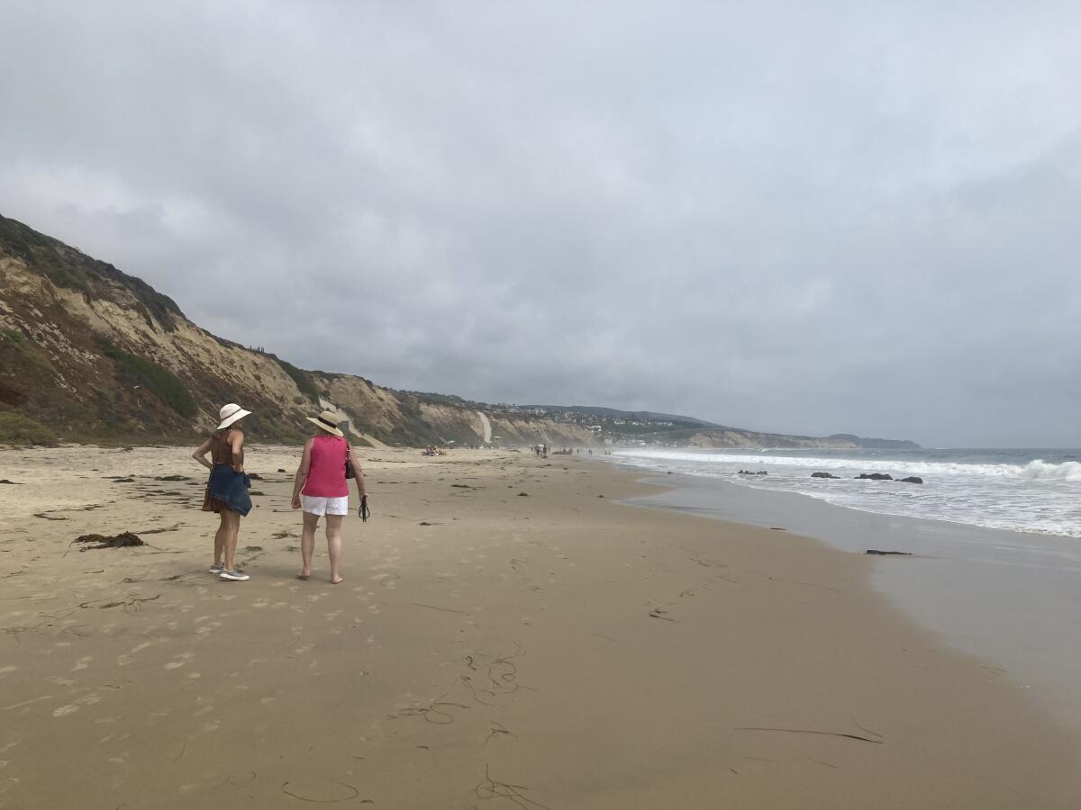 People enjoy Crystal Cove State Beach in Orange County.