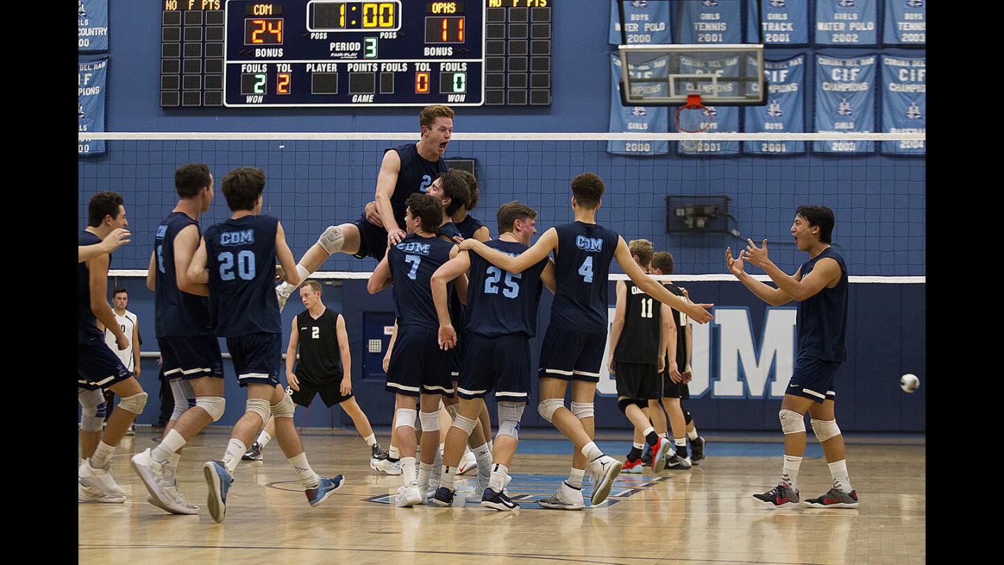Corona del Mar celebrates sweeping Oak Park in the semifinals of the CIF Southern Section Division 1 playoffs on Wednesday, May 17.