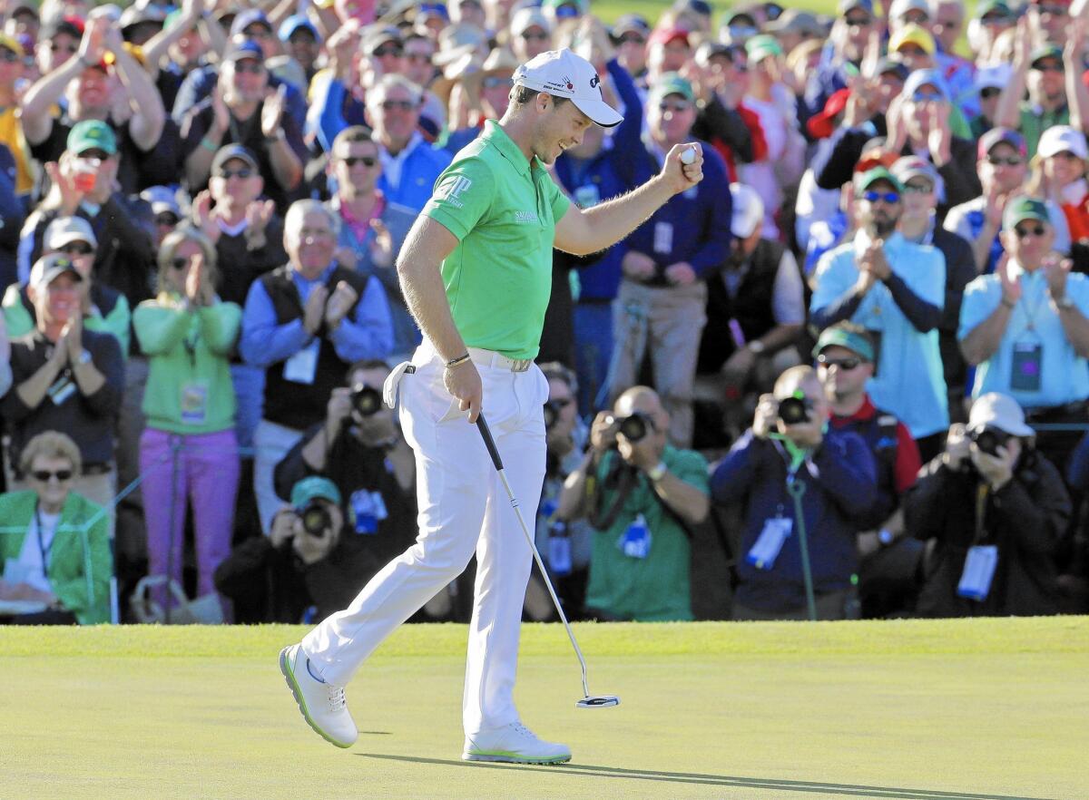 Danny Willett celebrates on the 18th green after finishing his final round at the Masters with a five-under-par 67.